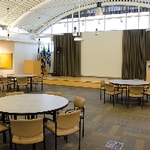 Large Seminar Room round tables with projector screen